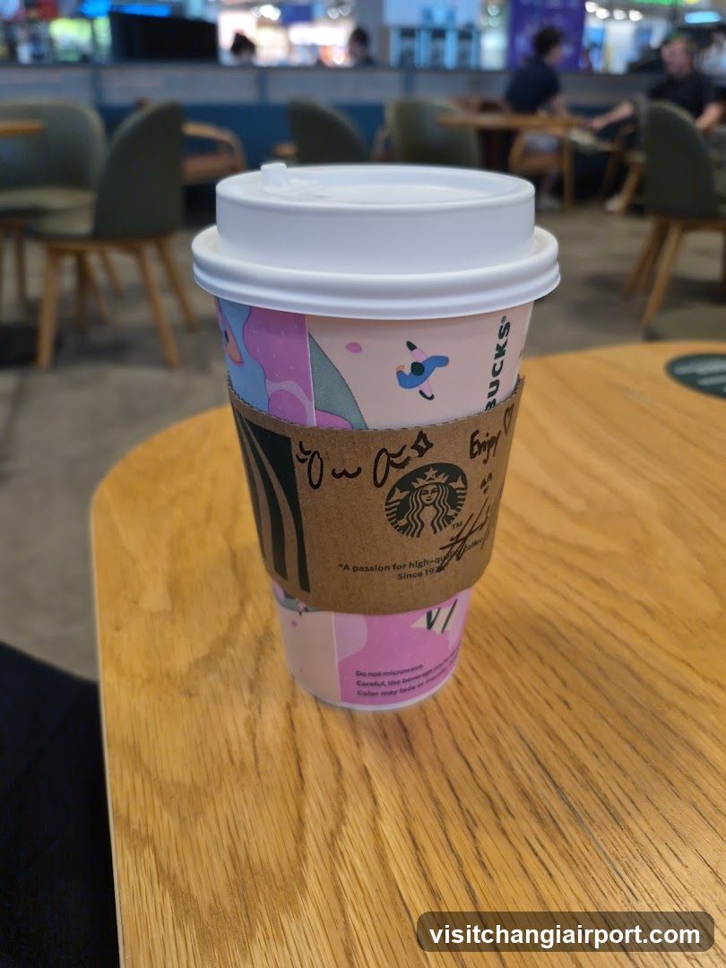Starbucks Coffee Cup on Wooden Table
