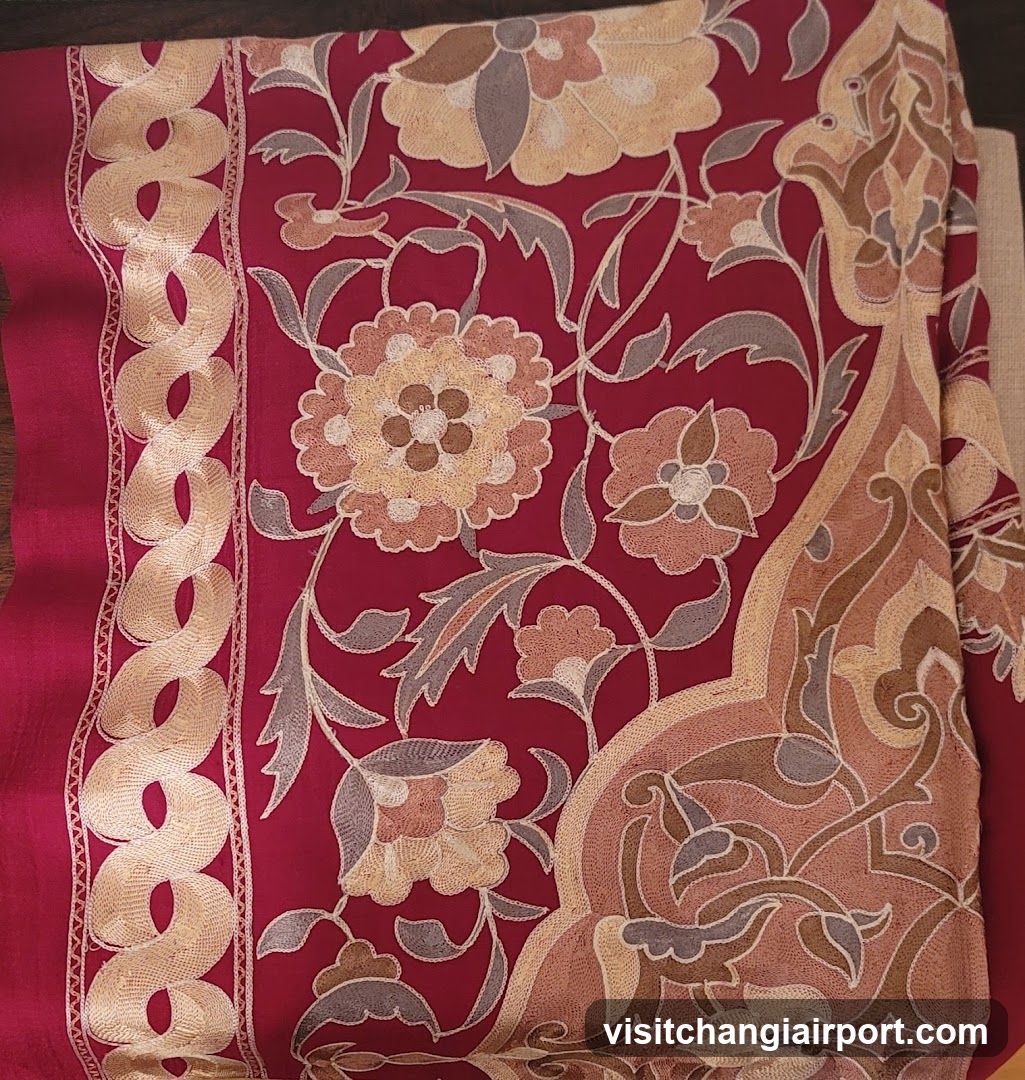 Red Fabric with Floral Embroidery