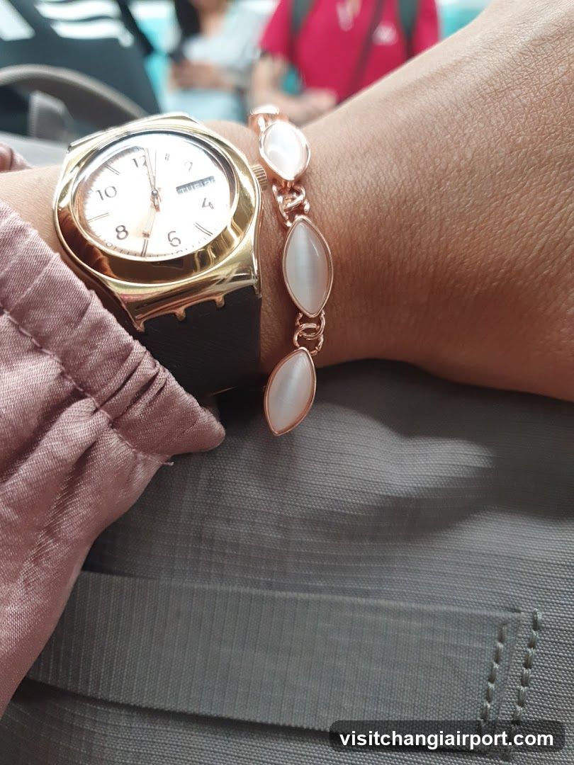 Wristwatch and Bracelet on Arm