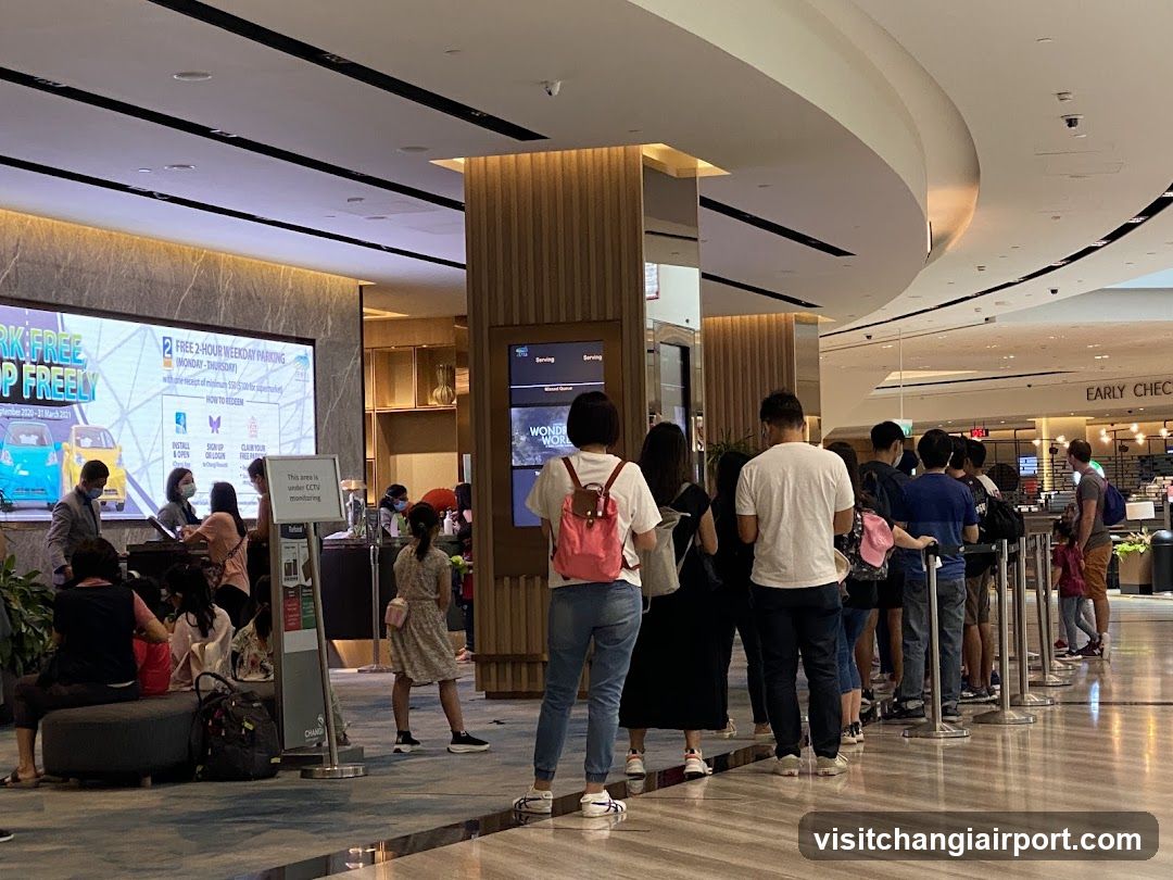 Airport Check-in Area with Queue and Digital Displays