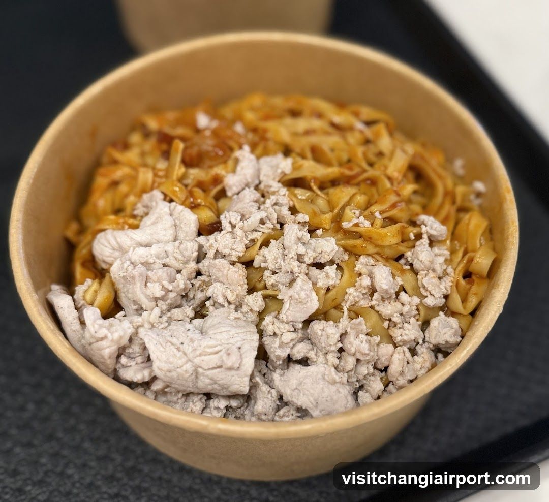 Bowl of noodles with minced meat topping