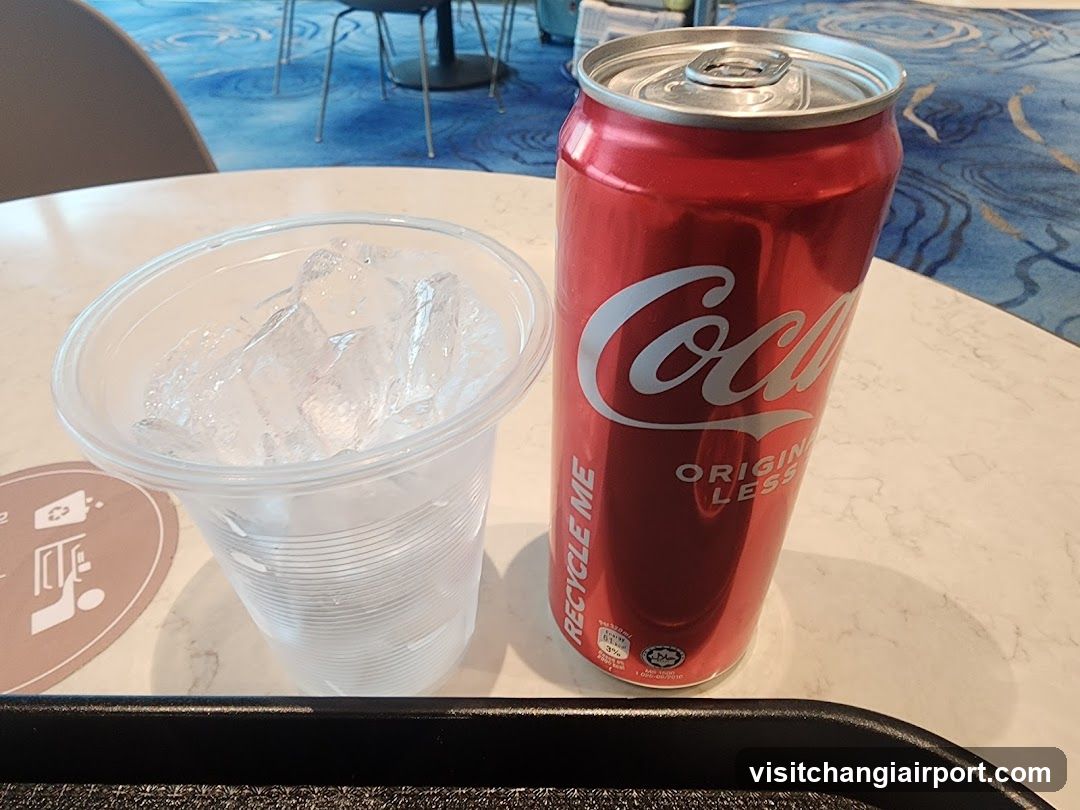 Coca-Cola Can and Ice Cup on Table
