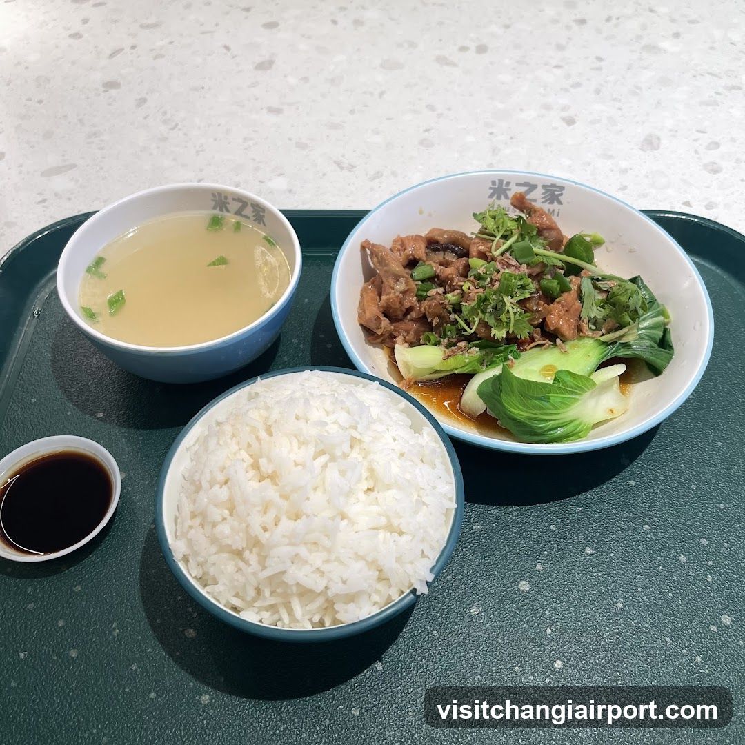 Bowl of food with rice and soup