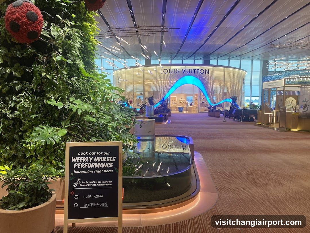 Airport Terminal Interior with Louis Vuitton Store and Ukulele Performance Sign