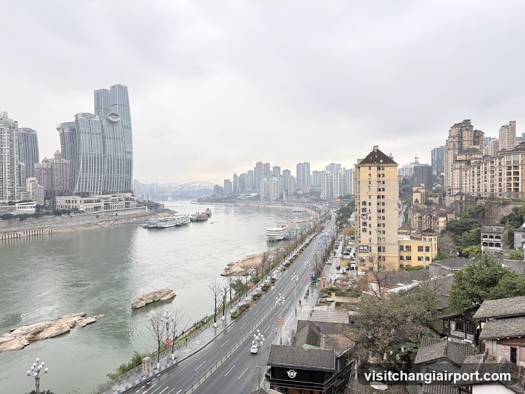 River Cityscape with Buildings and Road