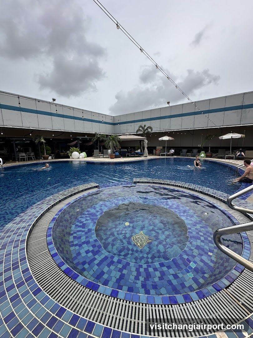 Pool Area with Circular Hot Tub