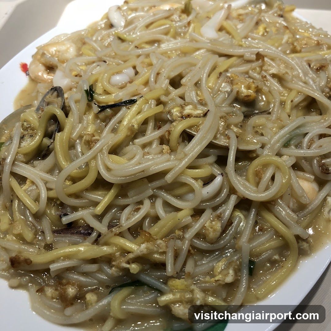 Stir-fried noodles with seafood and egg