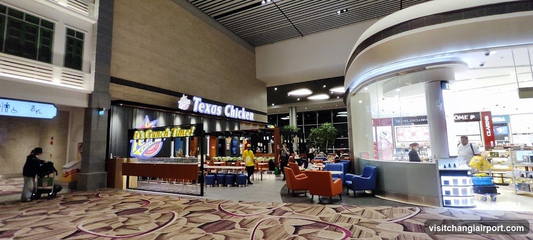 Airport Terminal Interior with Food Court and Retail Shops