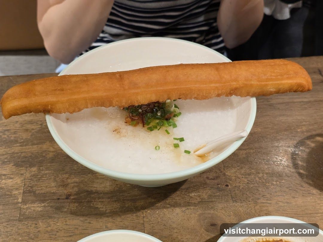 Dish with fried dough stick and congee
