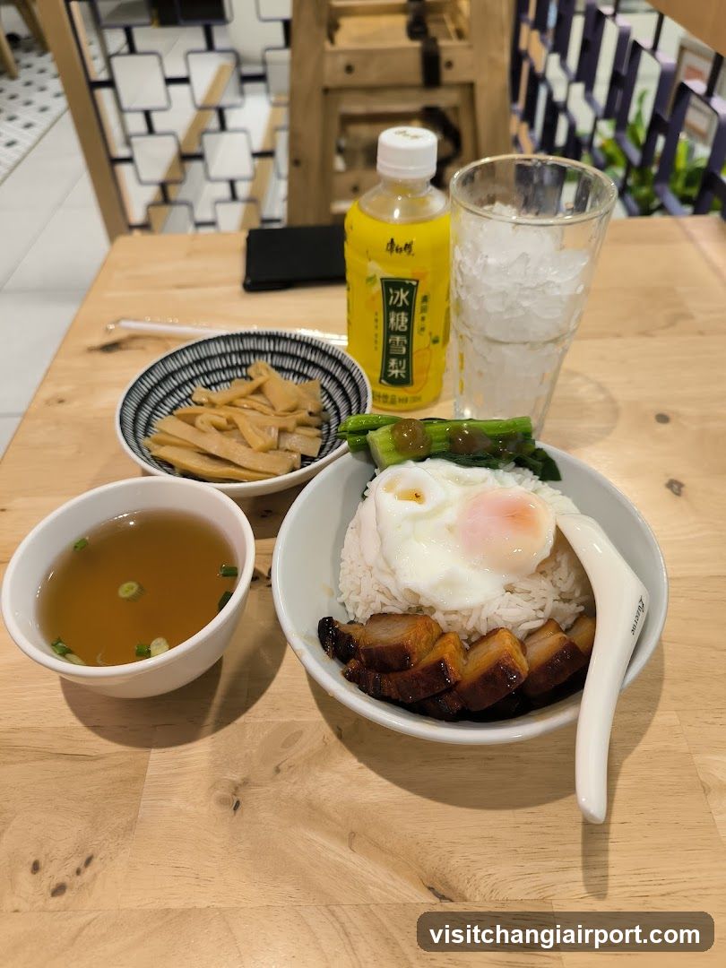 Rice Bowl Meal with Drink and Side Dishes