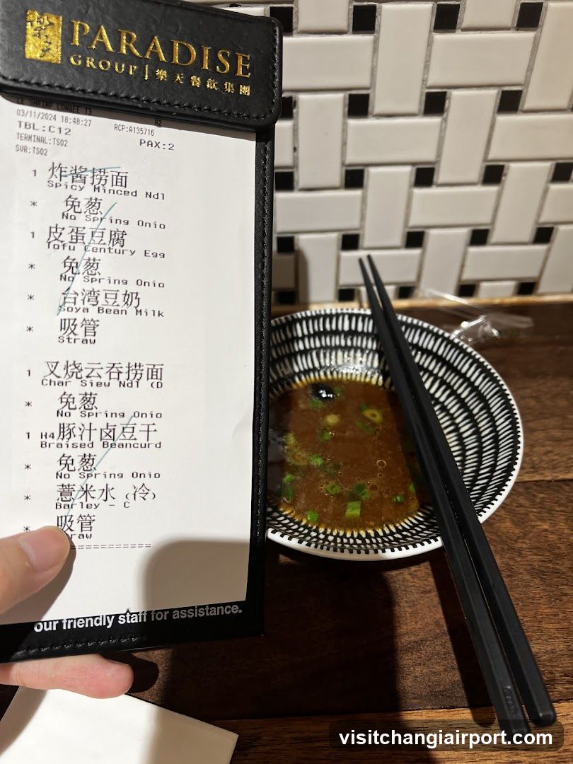 Paradise Group Receipt and Bowl of Soup