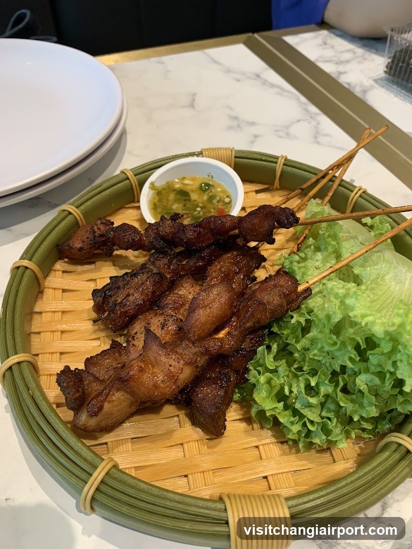 Grilled Meat Skewers with Lettuce and Dipping Sauce