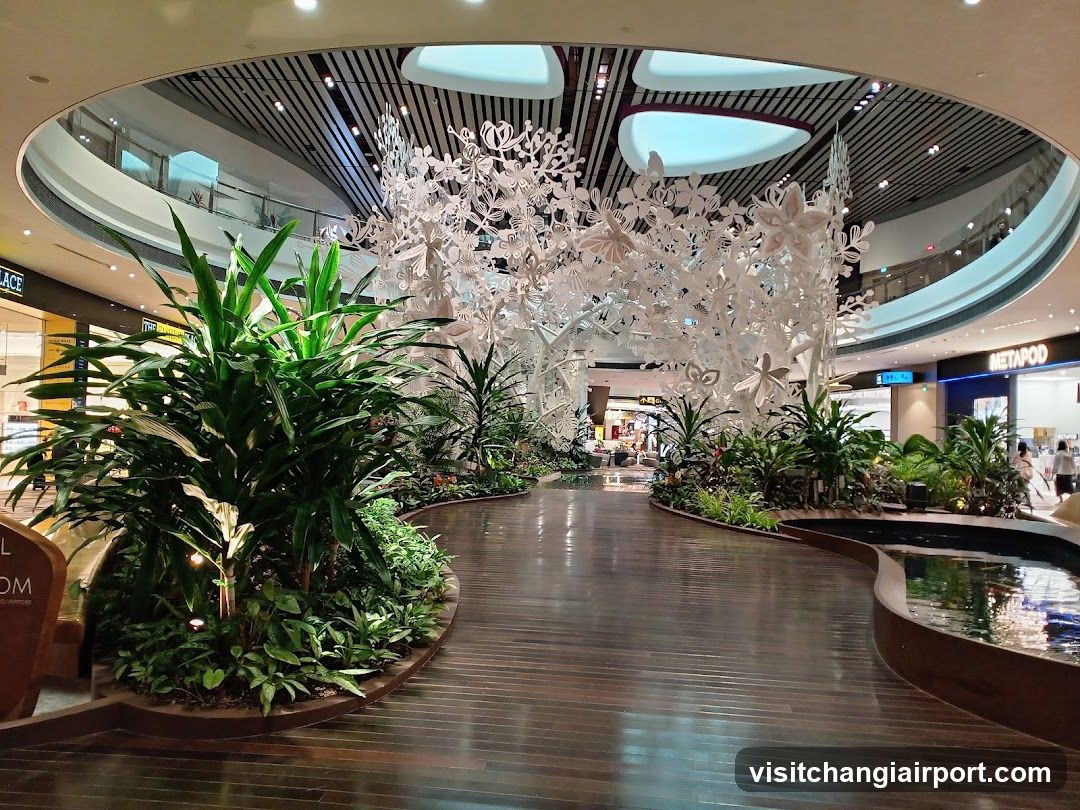 Mall Interior with Plants and Art Installation