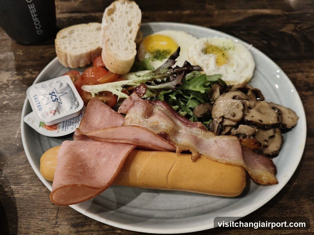 Breakfast Plate with Eggs, Bacon, Ham, Mushrooms and Bread