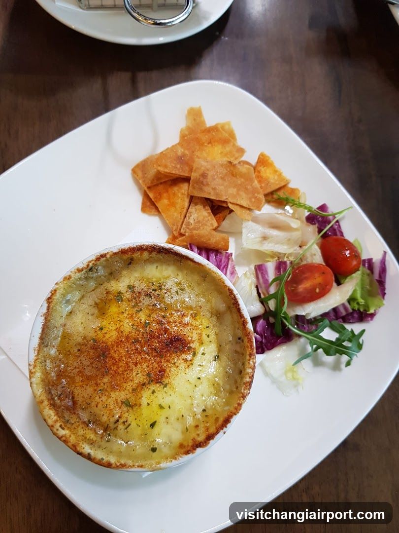 Baked Dish with Chips and Salad