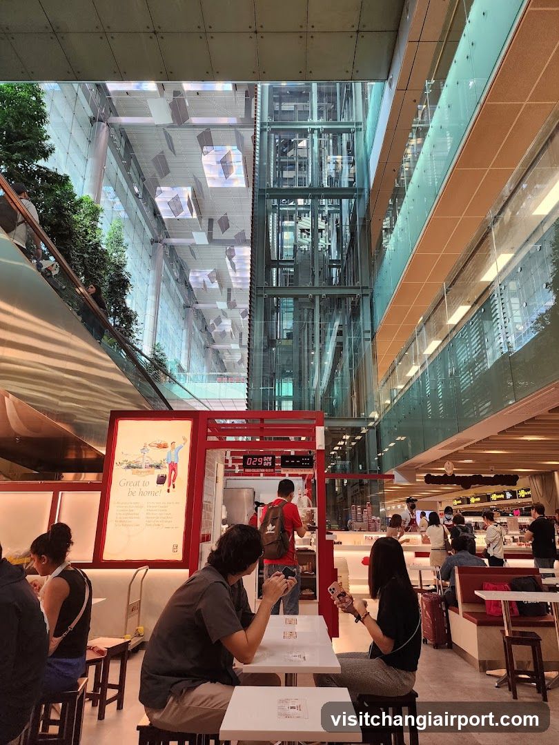 Food Court Interior with Elevator and Seating Area