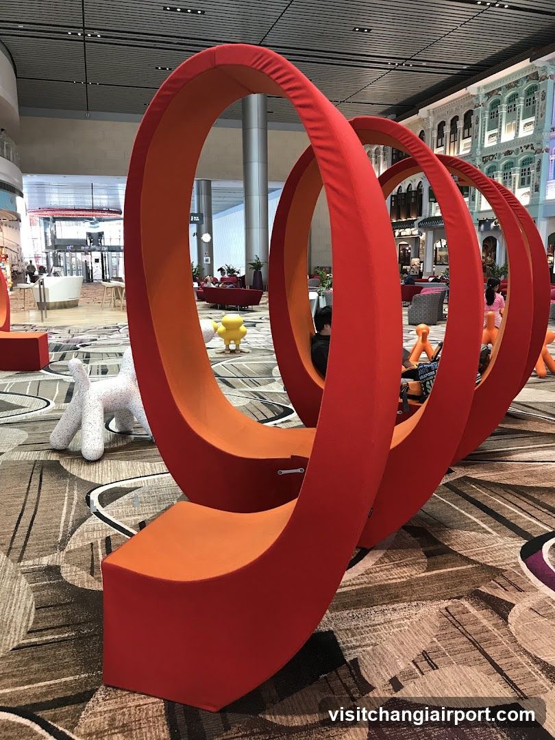 Red Ring Sculpture in Airport Terminal