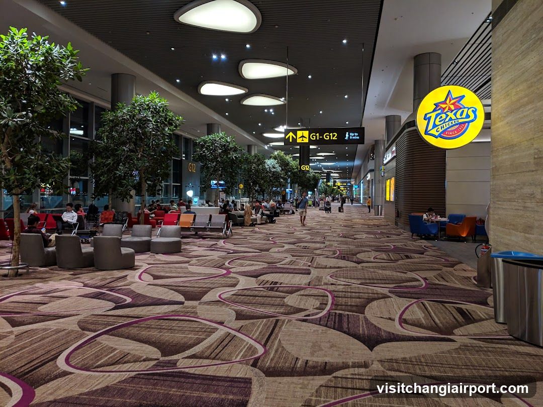 Airport Terminal Interior with Texas Roadhouse Sign