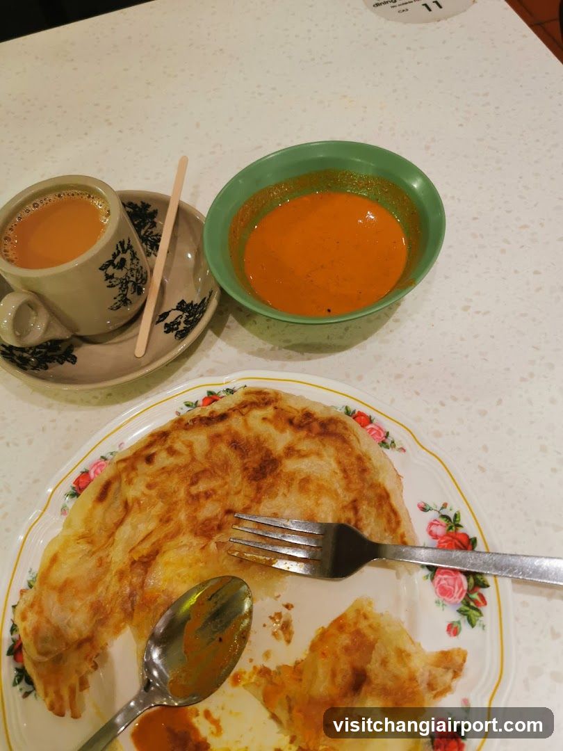 Breakfast Meal with Roti Canai and Tea
