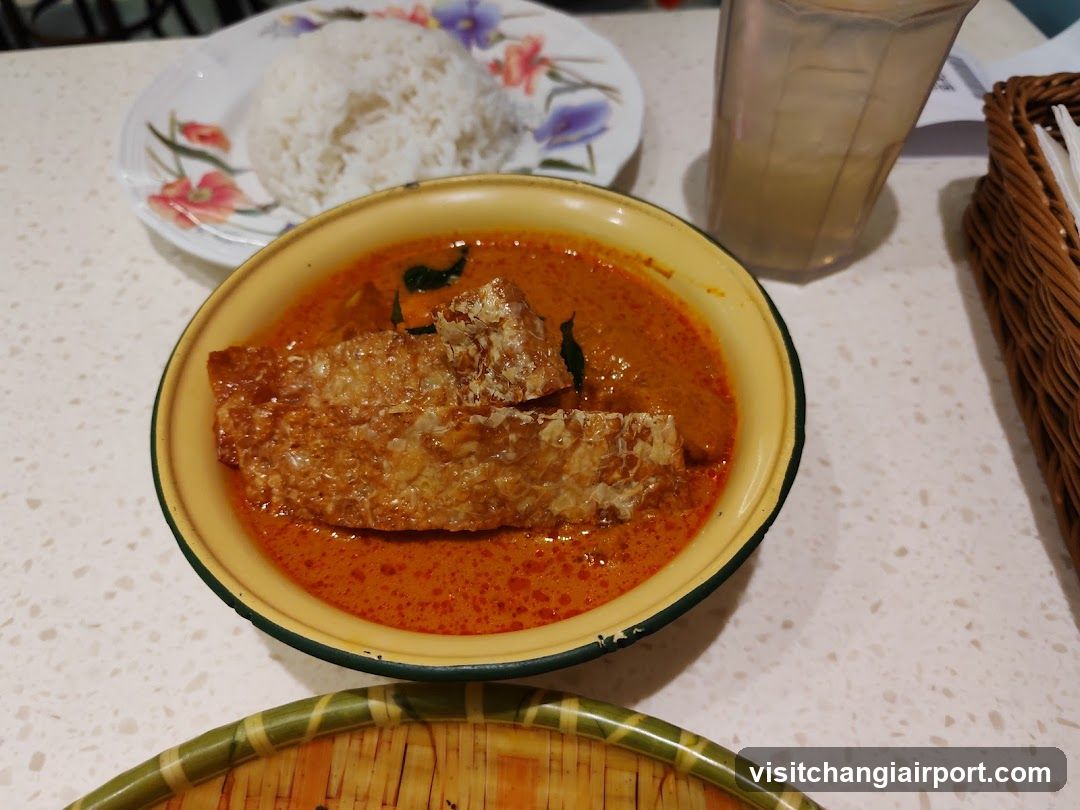 Curry Dish with Rice and Drink