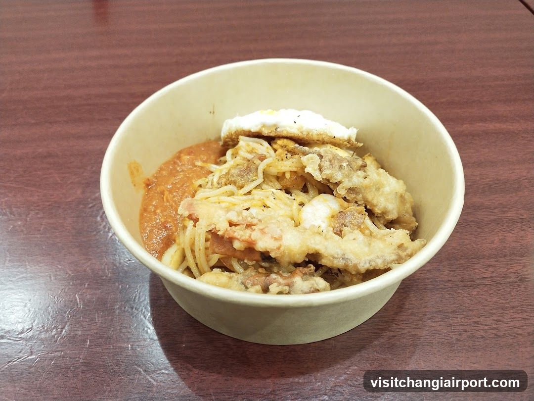 Bowl of Pasta with Fried Fish and Egg