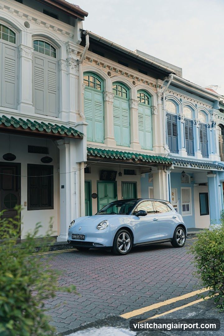 Light Blue Car in Colonial Street