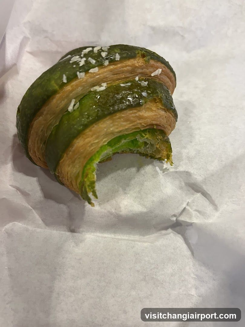Green Pastry with Coconut Shavings