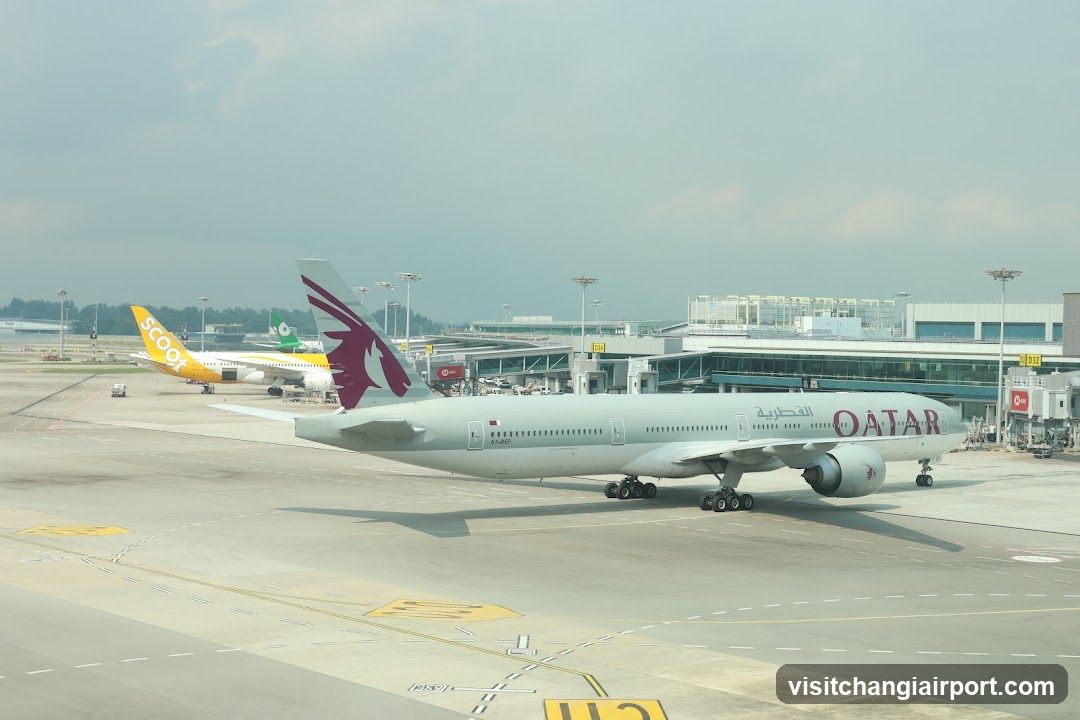 Airport Tarmac with Qatar Airways Aircraft