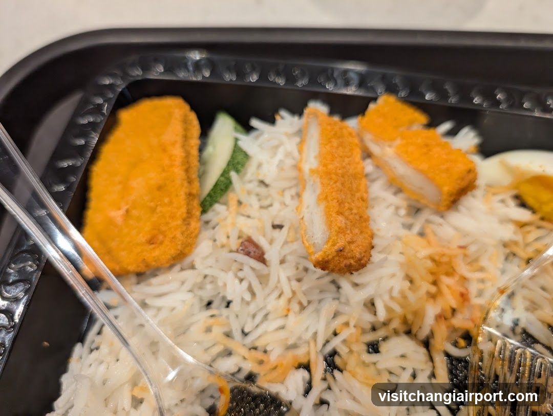 Bento Box with Fried Rice and Fish Cakes