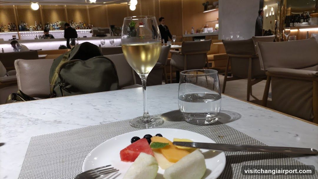 Dining Table with Wine and Fruit