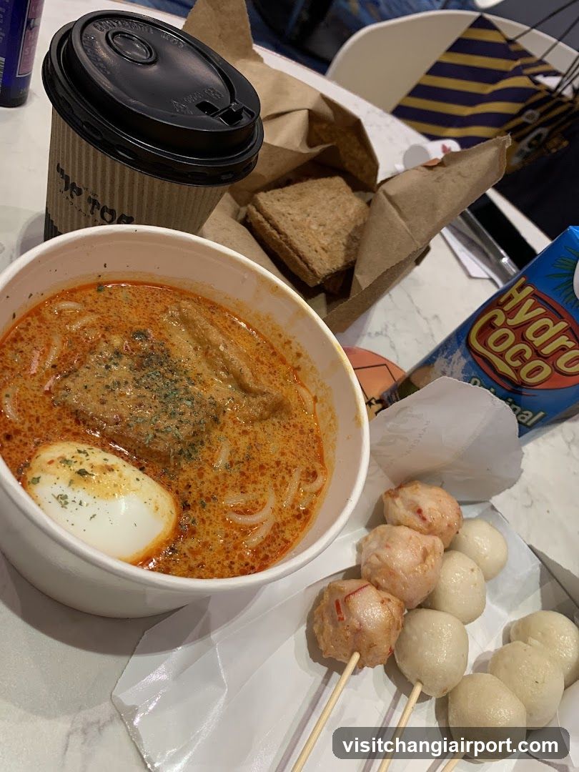 Food Spread with Curry Noodles and Fish Balls