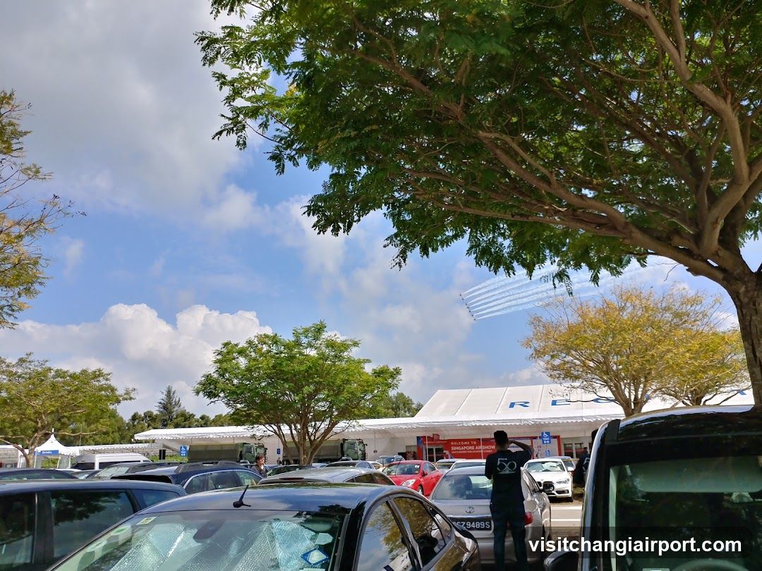 Parking Lot with Storefront in Background
