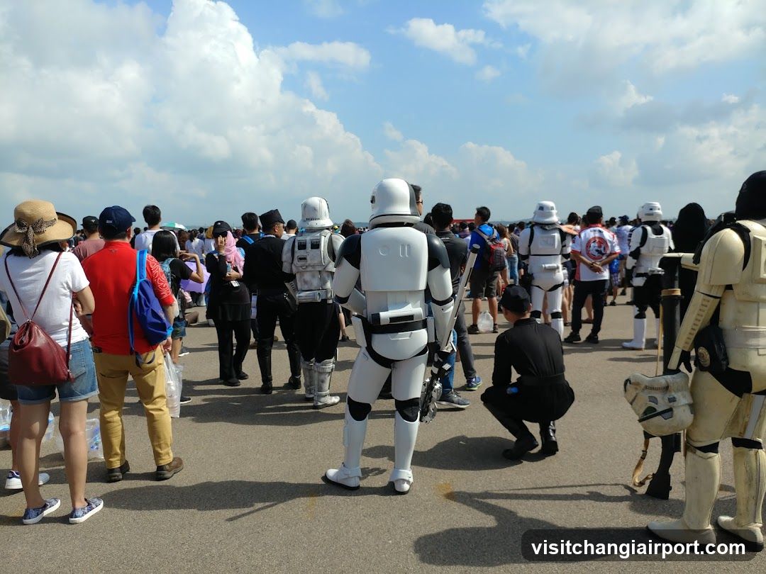 Crowd at an outdoor event with Stormtroopers
