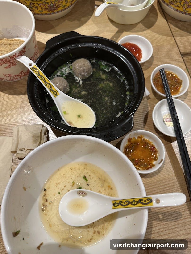 Dining Table with Soup and Noodles