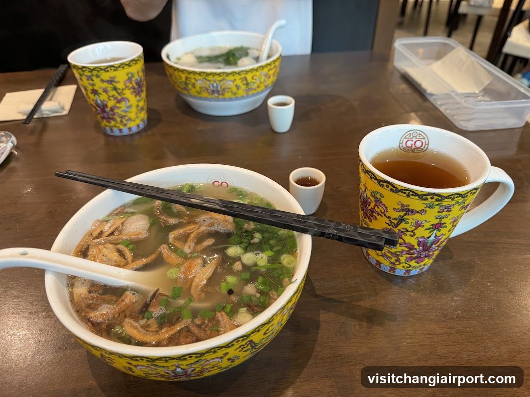 Dining Table with Bowls of Soup and Tea