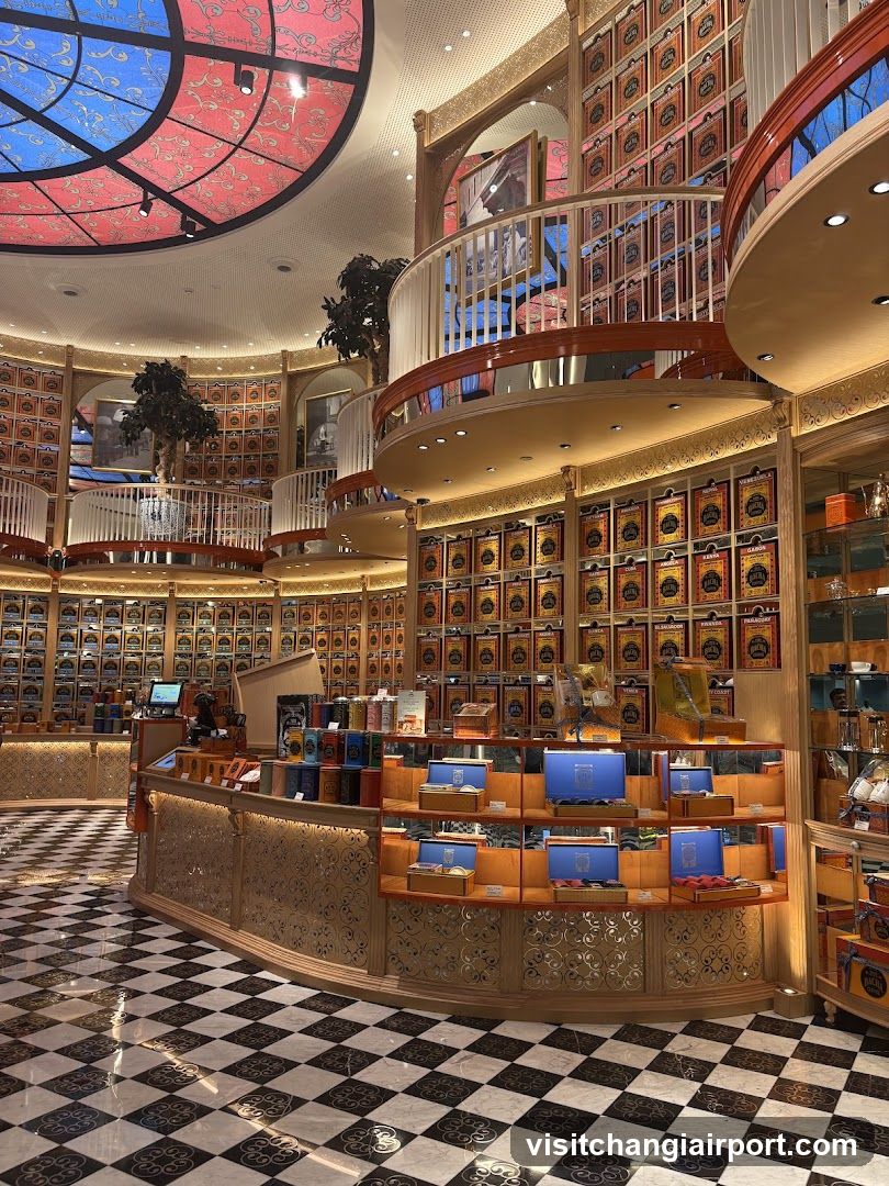Interior of a luxury store with checkered floor and stained glass ceiling