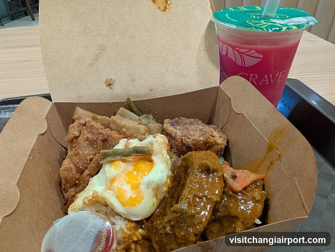 Curry Rice Meal with Fried Egg and Drink