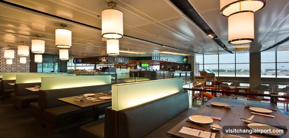 Restaurant Interior with Booth Seating and Large Windows