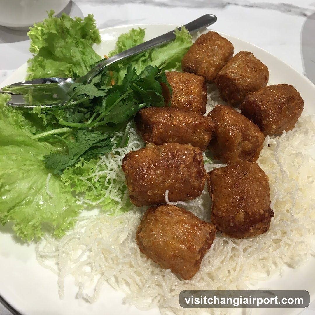 Fried Cakes with Noodles and Greens