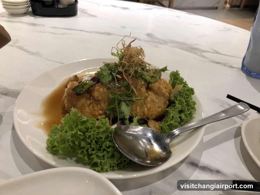 Crispy Fried Dish with Sauce and Garnish