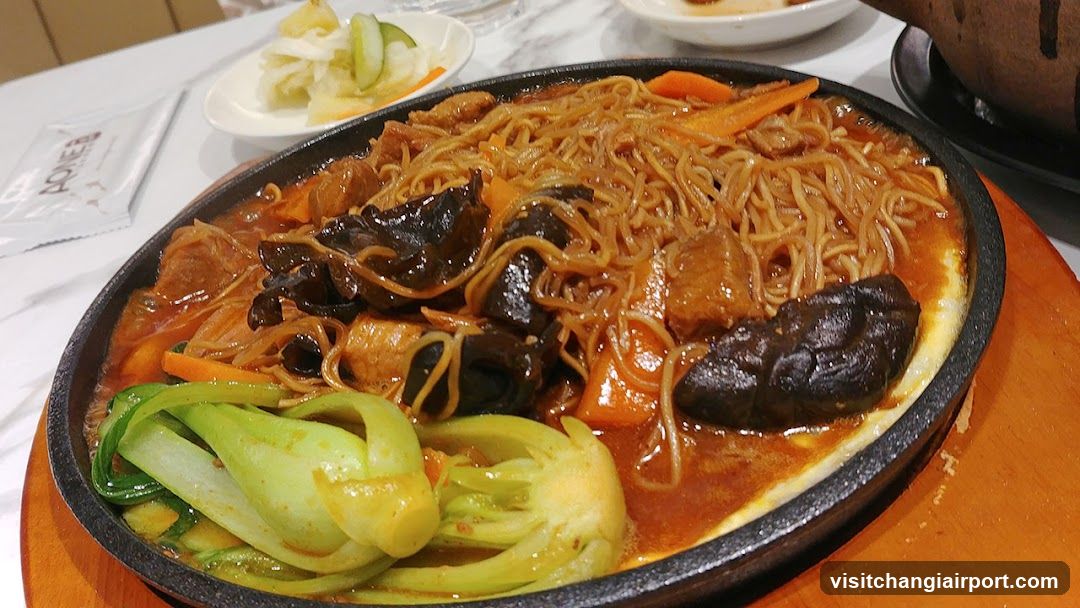 Sizzling Noodle Dish with Vegetables and Mushrooms