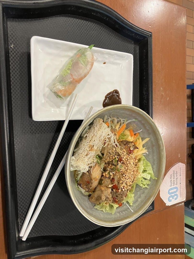 Vietnamese-style salad bowl with spring roll