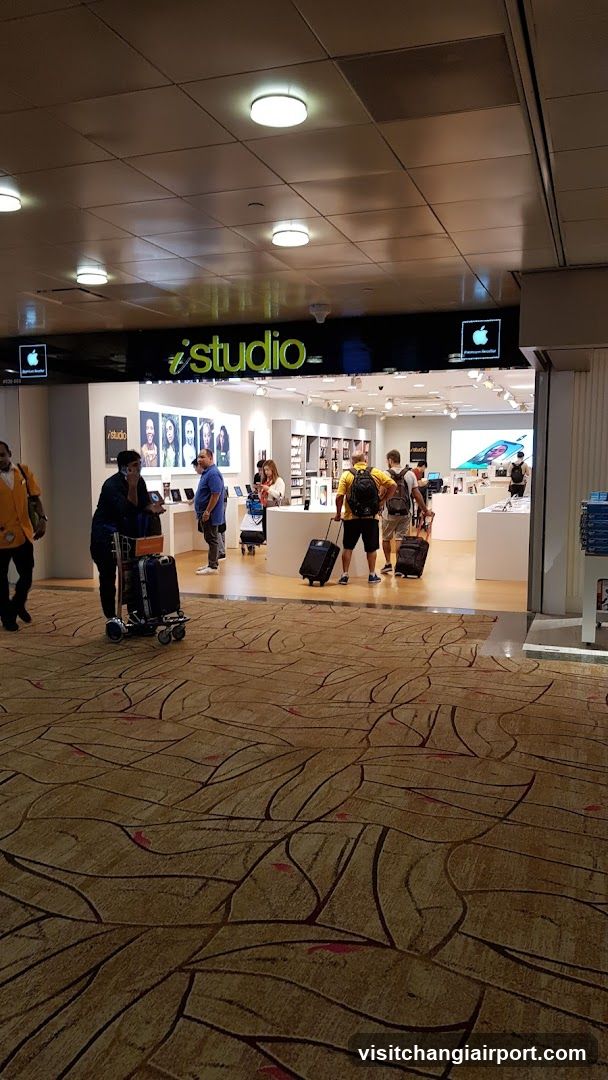 Apple Store Interior with Travelers
