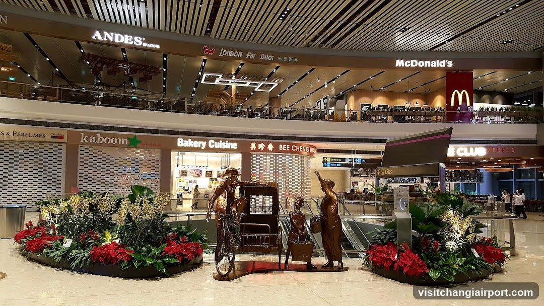 Airport Terminal Interior with Shops and Sculpture