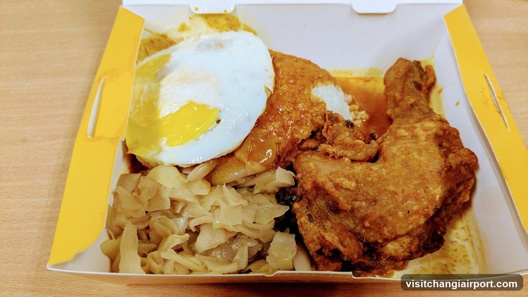 Fried Chicken Meal with Fried Egg and Pickled Vegetables
