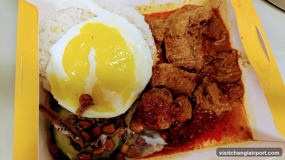 Nasi Lemak with Fried Egg and Beef Rendang