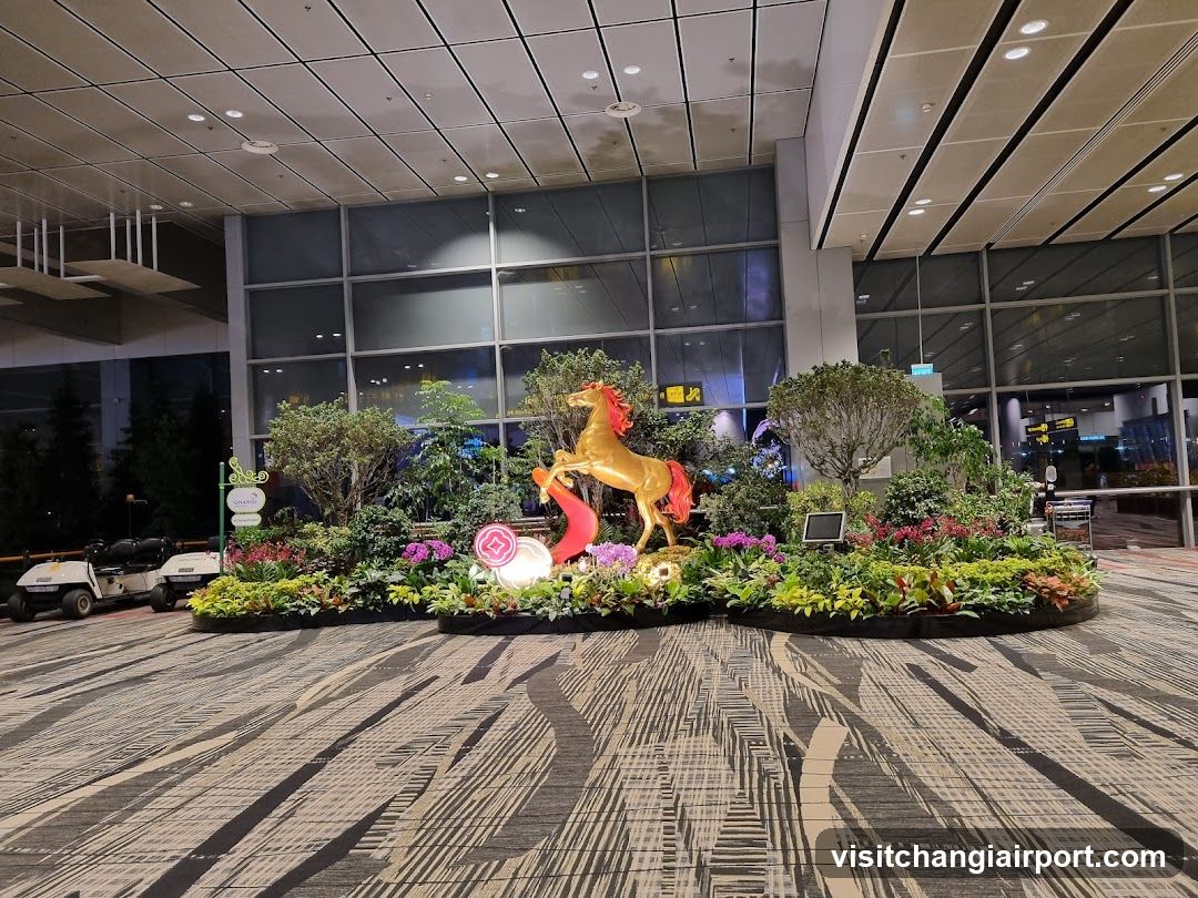 Airport Terminal Decor with Golden Horse Statue