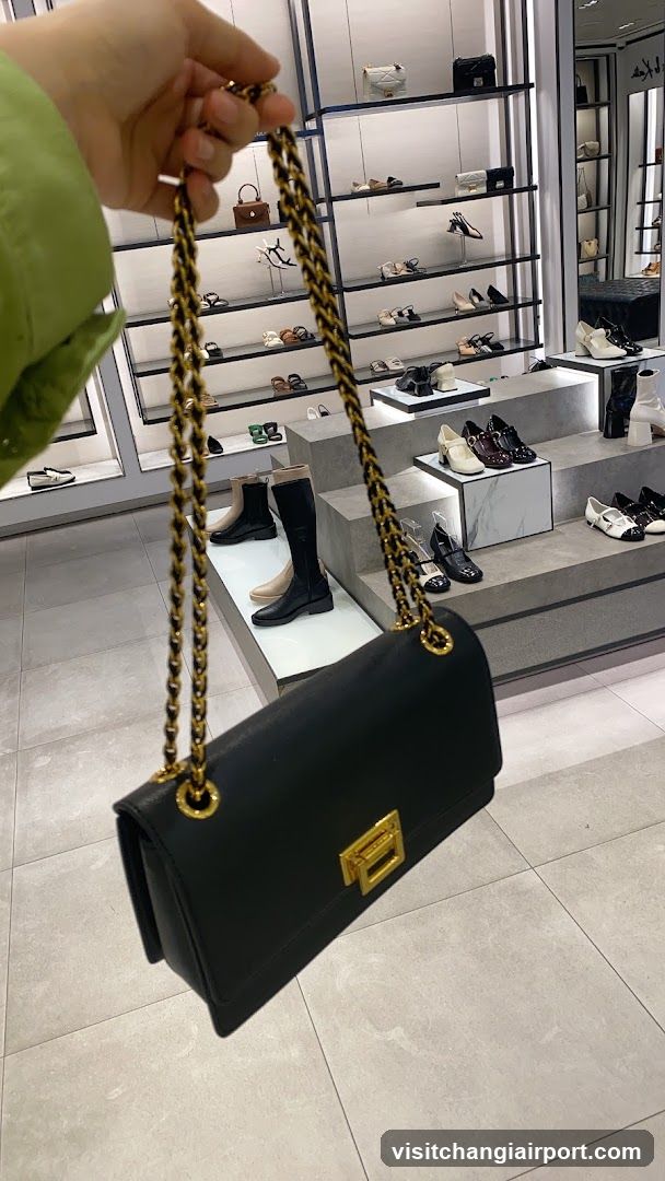 Black Chain Bag in Shoe Store Interior