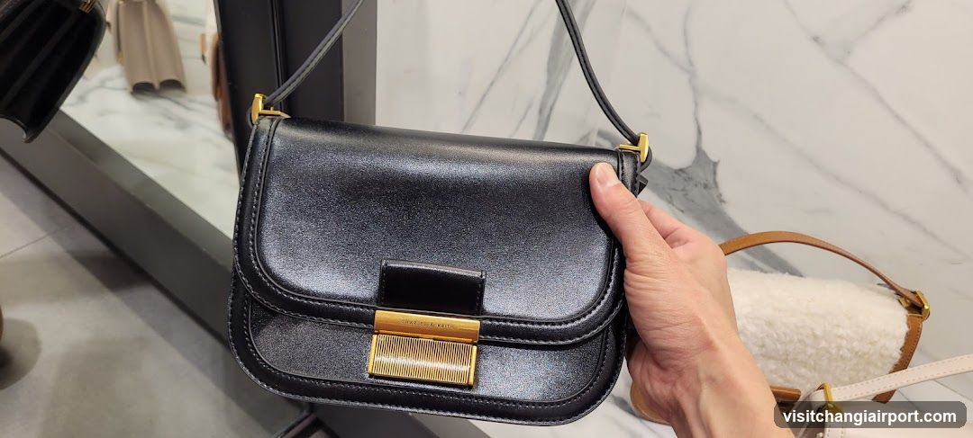 Black Leather Handbag Display