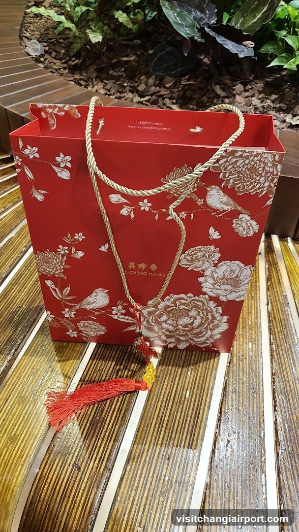 Red Gift Bag with Floral Design